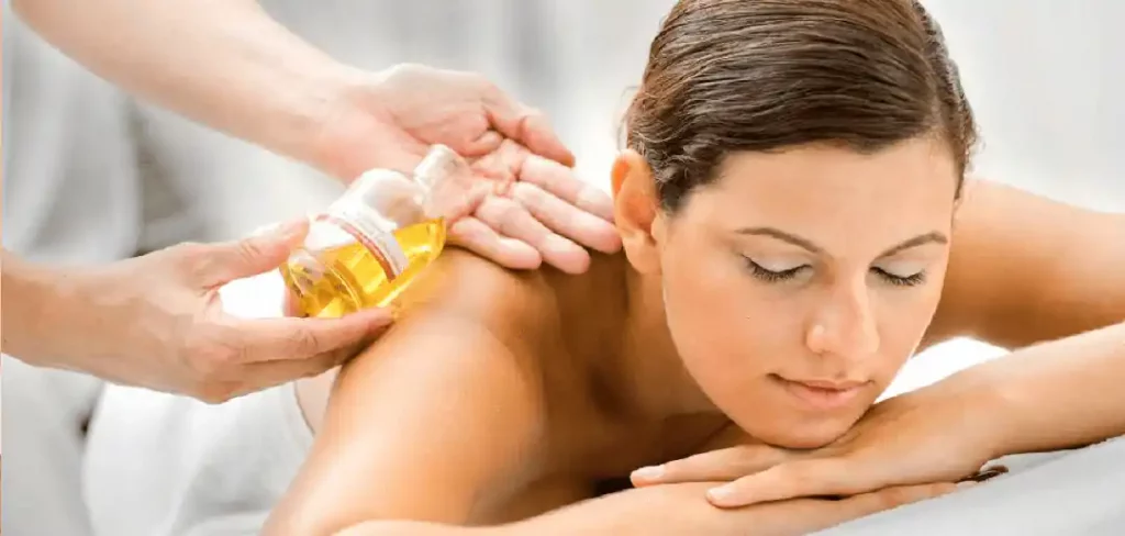 massagin woman with essential oils
