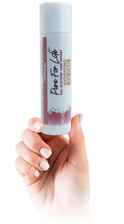 CBD lip balm tube in the hand of a happy customer